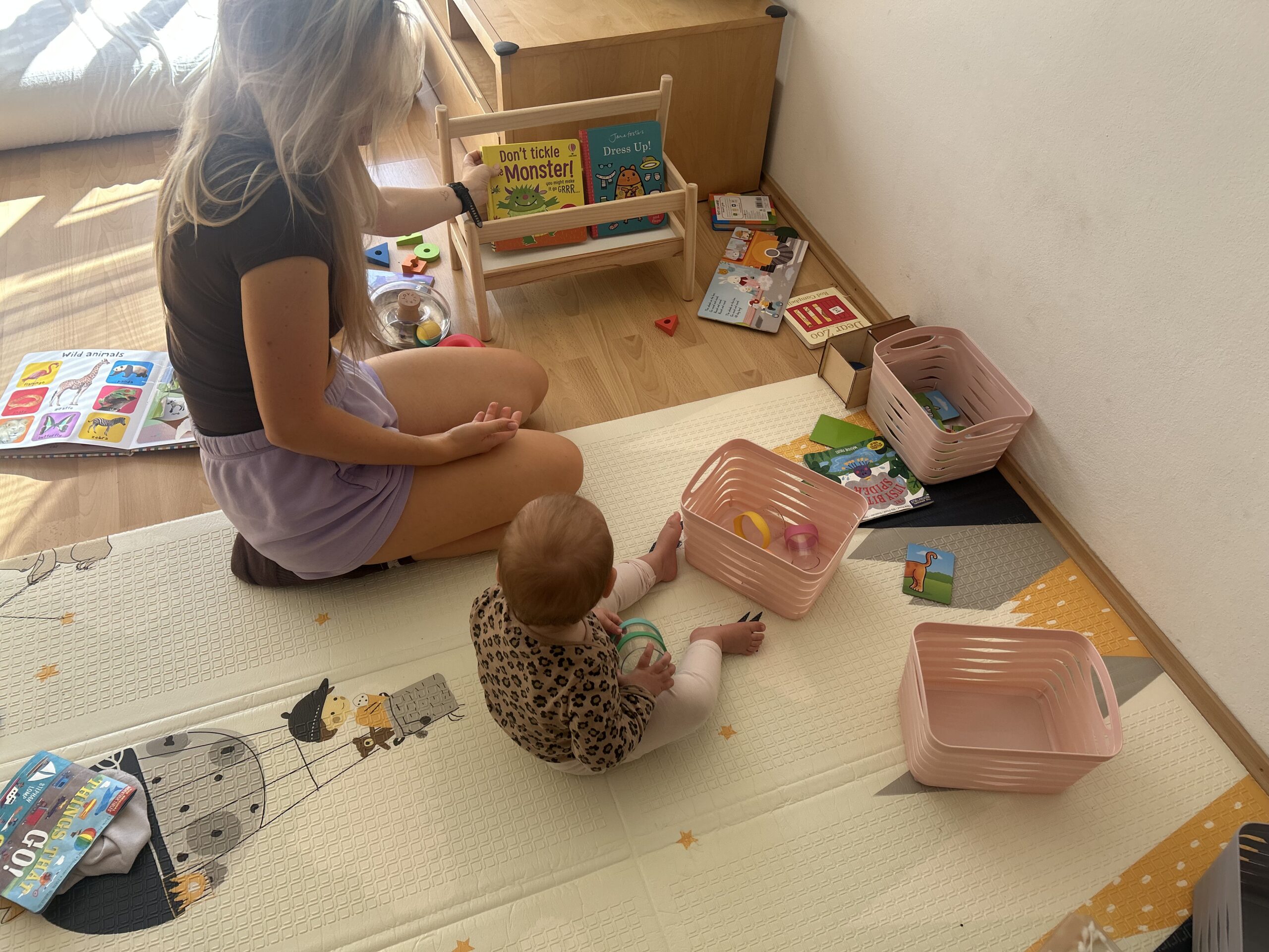 Betty and Becky in their English corner with books and baskets