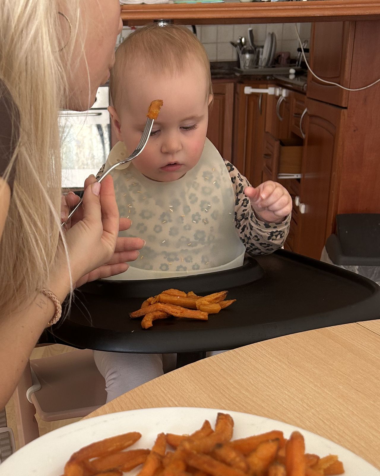 Becky in her high chair at lunch